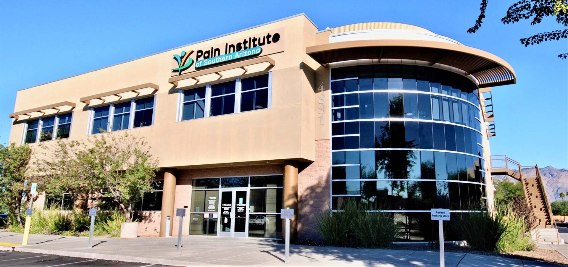 Outside view of a medical pain institute with mirror glasses